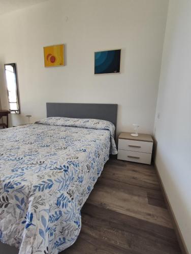 Cama o camas de una habitación en Un Angolo di Mare in Sardegna