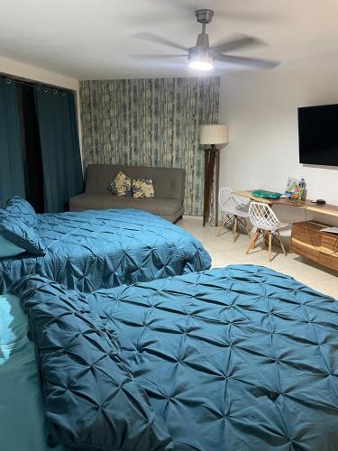 Postel nebo postele na pokoji v ubytování Posada San Carlos 316