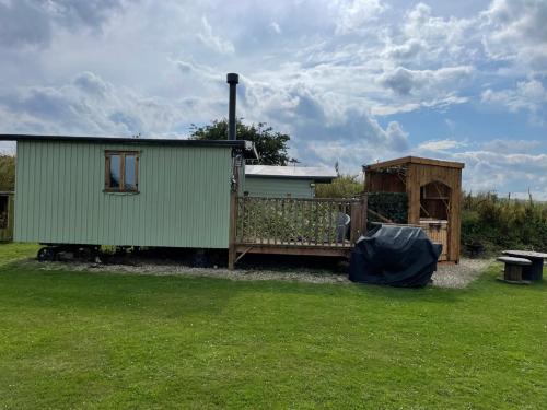 Oakley View Shepherds Hut with hot tub photo 35