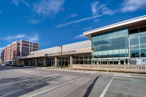 a large building with a street in front of it at Hilton Garden Inn Terre Haute in Terre Haute