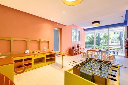 a childrens play room with a pool table at Barceló Palmeraie Oasis Resort in Marrakech