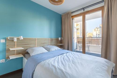 Posteľ alebo postele v izbe v ubytovaní Charming apartment near Paris