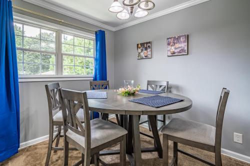 a dining room with a table and chairs at Homely & Alluring 5 bedrooms in Atlanta! in Atlanta