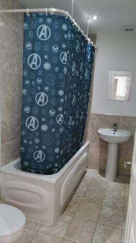 Een badkamer bij Thales Home FFDBL4
