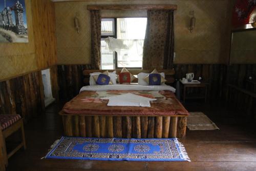 Postel nebo postele na pokoji v ubytování Cherry Resort