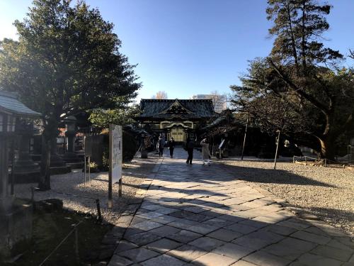 a walkway in front of a building in a park at NOHGA HOTEL UENO TOKYO in Tokyo