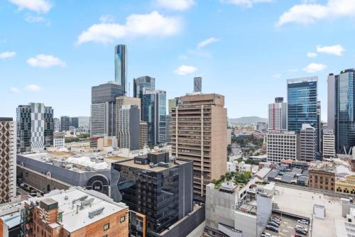 an aerial view of a city with tall buildings at City Centre! 1Bed/1Bath/Study/1Car/Balcony ~ CBD in Brisbane