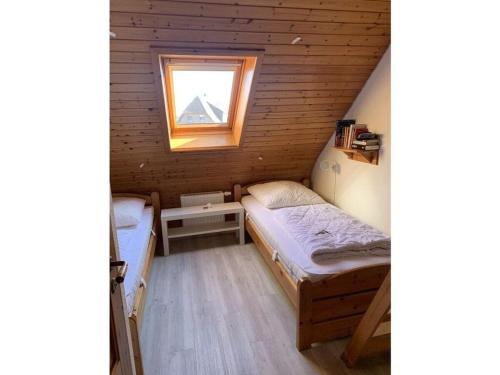 Blauort in Friedrichskoog-Spitzeにあるベッド