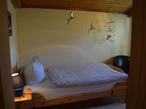 Posteľ alebo postele v izbe v ubytovaní small beach flea