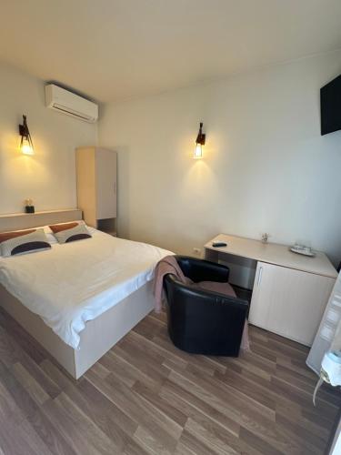 Cama o camas de una habitación en Pensiunea Drobeta