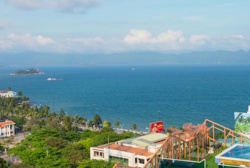 a view of the ocean from a city at TND Hotel in Nha Trang