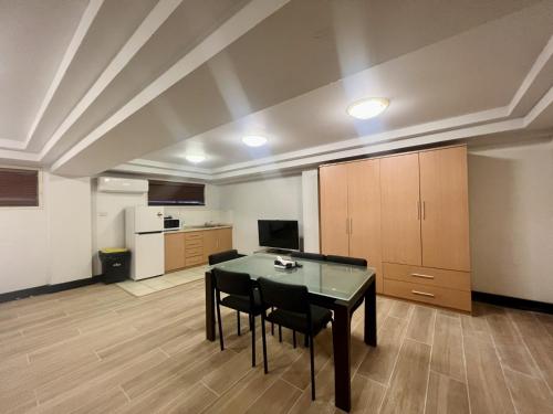 Kuchyň nebo kuchyňský kout v ubytování Annerley Motor Inn