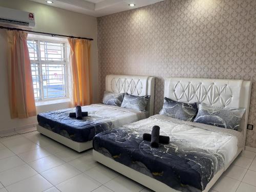 Ένα ή περισσότερα κρεβάτια σε δωμάτιο στο Setia 9 Austin Near LongSing YiJia HeLiXuan New Cathay Restaurant