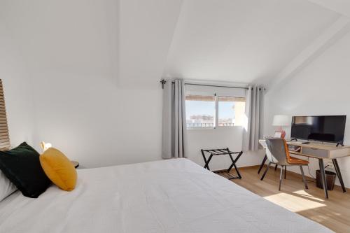 Letto o letti in una camera di Hotel Madrid