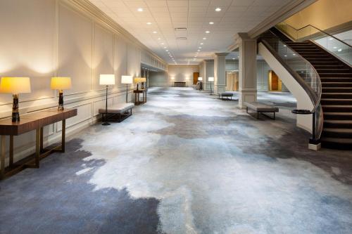 a long hallway with a bunch of water on the floor at The Westin Galleria Houston in Houston