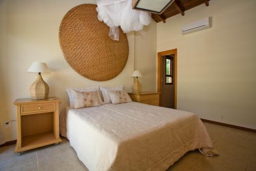 Ein Bett oder Betten in einem Zimmer der Unterkunft Pipa Hills Casa Tulipa