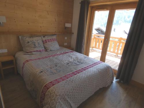 Ένα ή περισσότερα κρεβάτια σε δωμάτιο στο Appartement cocon centre village, 4 personnes, 2 chambres - SOURCES102