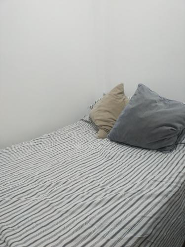 Säng eller sängar i ett rum på Begoña