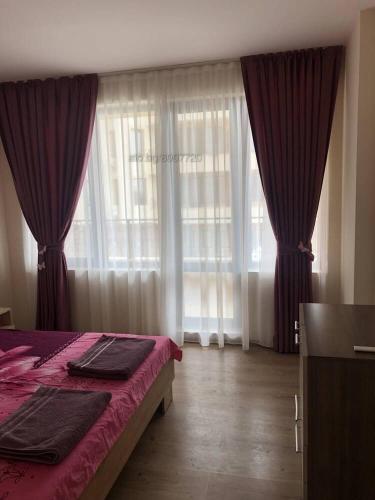Postel nebo postele na pokoji v ubytování Комплекс Рич 2