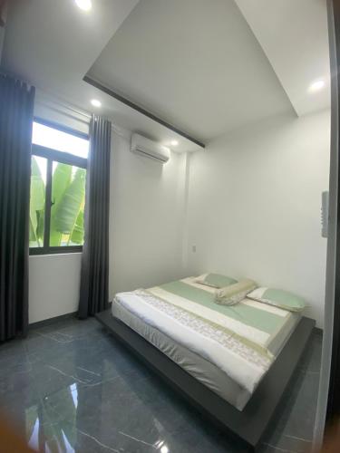 Cama ou camas em um quarto em Villa Komi