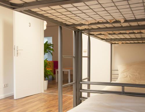 MAC City Hostel emeletes ágyai egy szobában
