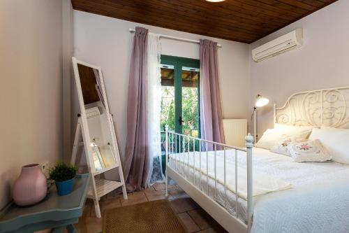 A bed or beds in a room at Villa Elli