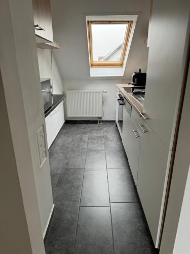 Η κουζίνα ή μικρή κουζίνα στο SUNSHINE Apartments Rust-Ringsheim