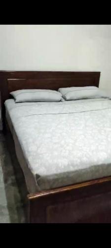 Un pat sau paturi într-o cameră la A&R house