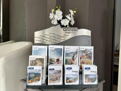 a display of cards on a table in a room at Hotel Royal in Riva del Garda