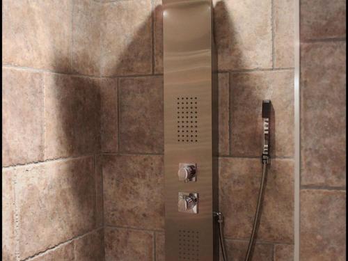 a shower with a glass door in a bathroom at Appartement Valloire, 4 pièces, 9 personnes - FR-1-263-215 in Valloire