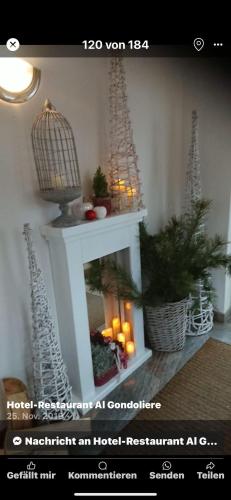 a picture of a living room with a fireplace at AL GONDOLIERE in Oppach