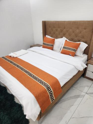Letto o letti in una camera di MARINA APPART Hôtel