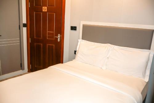 Postel nebo postele na pokoji v ubytování Starry Beach Inn