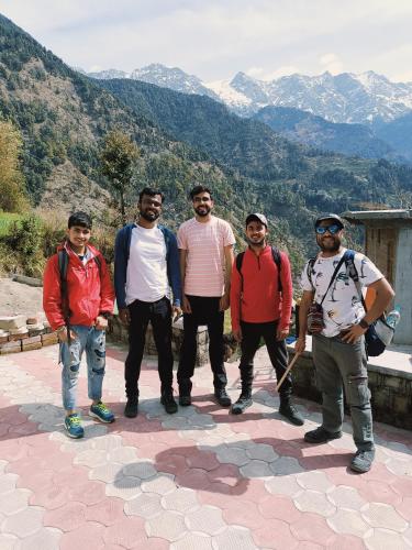 a group of men standing on top of a mountain at Kareri Wayfarer in Kareri