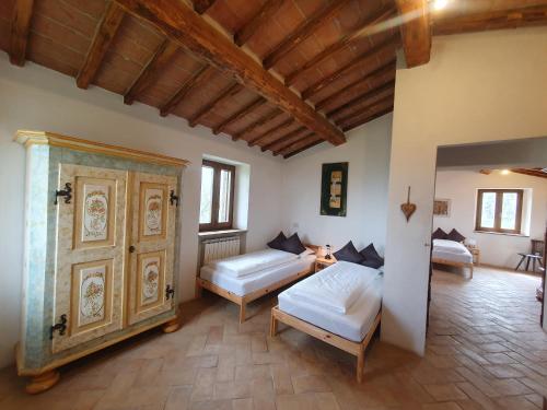 Ένα ή περισσότερα κρεβάτια σε δωμάτιο στο Villa Lisabetta