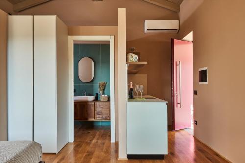 a bathroom with a sink and a mirror at Agriturismo Prato del Re in Prignano sulla Secchia