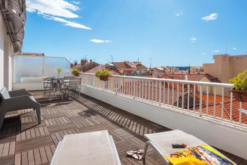 a balcony with a view of a city at Ibis Styles Menton Centre in Menton
