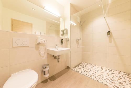 Koupelna v ubytování Ammi Hotel Garni