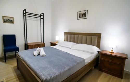 Postel nebo postele na pokoji v ubytování Villa Balliu