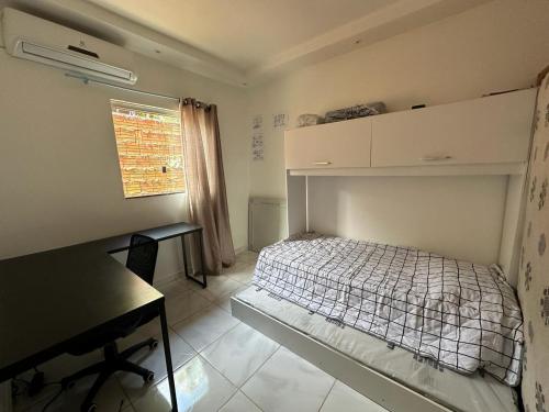 Katil atau katil-katil dalam bilik di Casa chácara para alugar no período do festival de Parintins