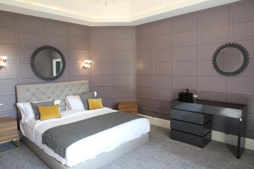 Ліжко або ліжка в номері Ponsbourne Park