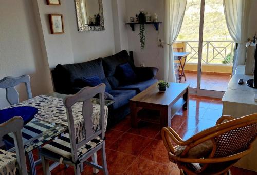 Prostor za sedenje u objektu Cabo de Palos Apartment