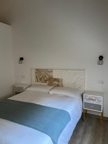 Katil atau katil-katil dalam bilik di Reginita Apartamentos