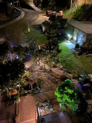an overhead view of a garden at night at Casa Erceg Amor vincit Omnia in Skradin