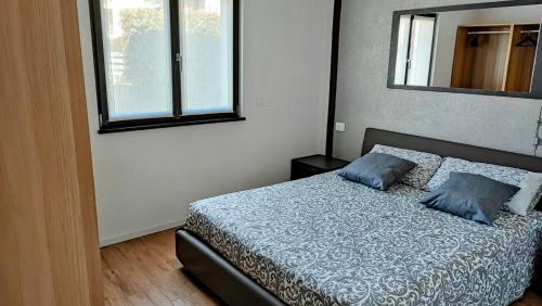 Postel nebo postele na pokoji v ubytování FabysHouse Appartamento in Villa