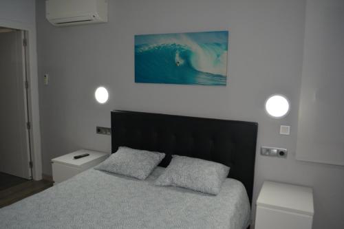 Ένα ή περισσότερα κρεβάτια σε δωμάτιο στο Casa Cari