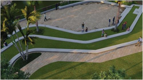 a group of people walking around a park at PANTHASHALA Dooars in Lataguri