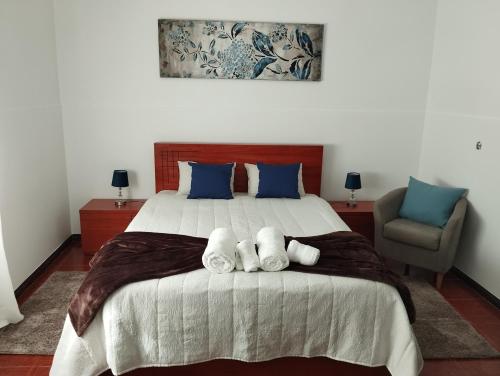 Un pat sau paturi într-o cameră la Casa do Lavrador