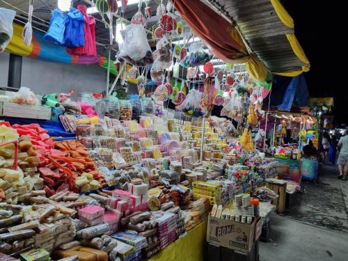 a market filled with lots of different types of food at Melaque Rent House 1 in San Patricio Melaque