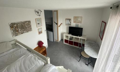 Studio a la mer piscine wifi parking clim